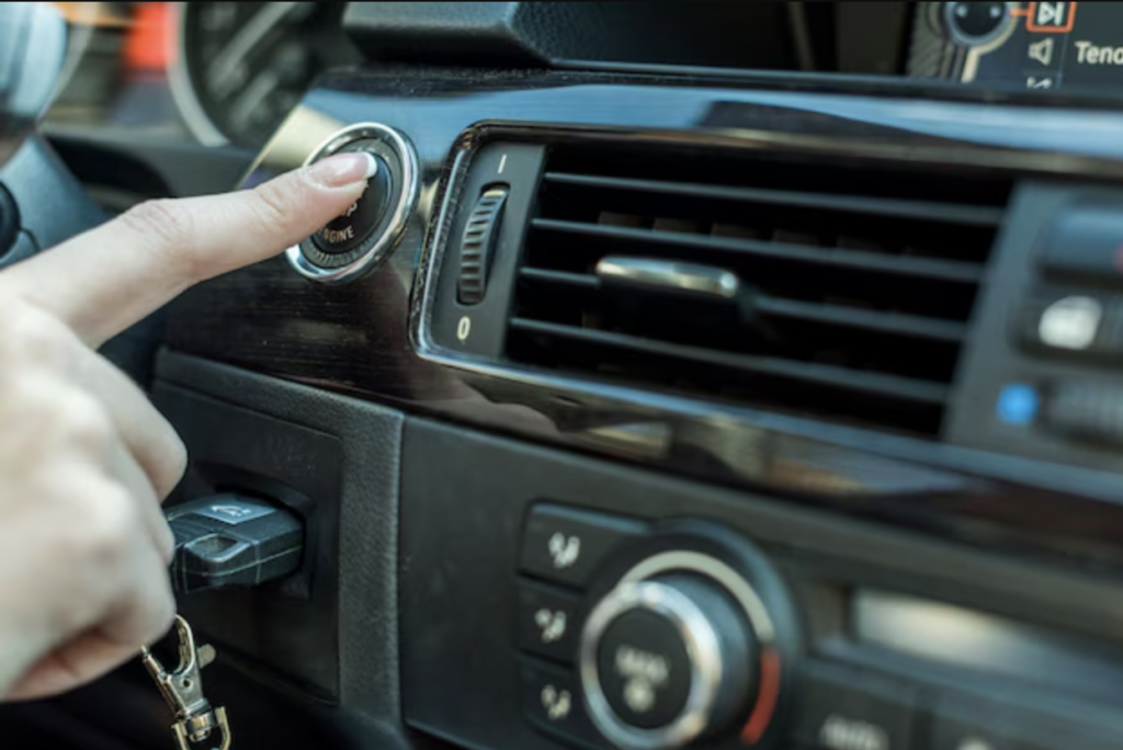 Close-up of a vehicle air conditioning system showing vents and controls.